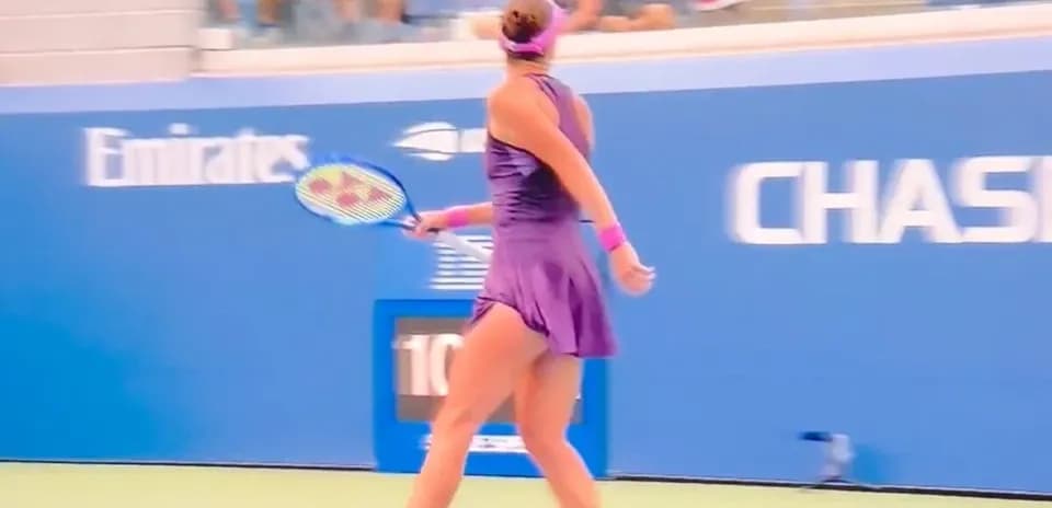 Player preparing to hit a backhand on court