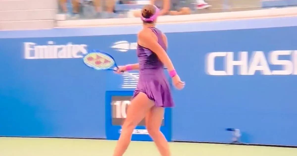 Player preparing to hit a backhand on court
