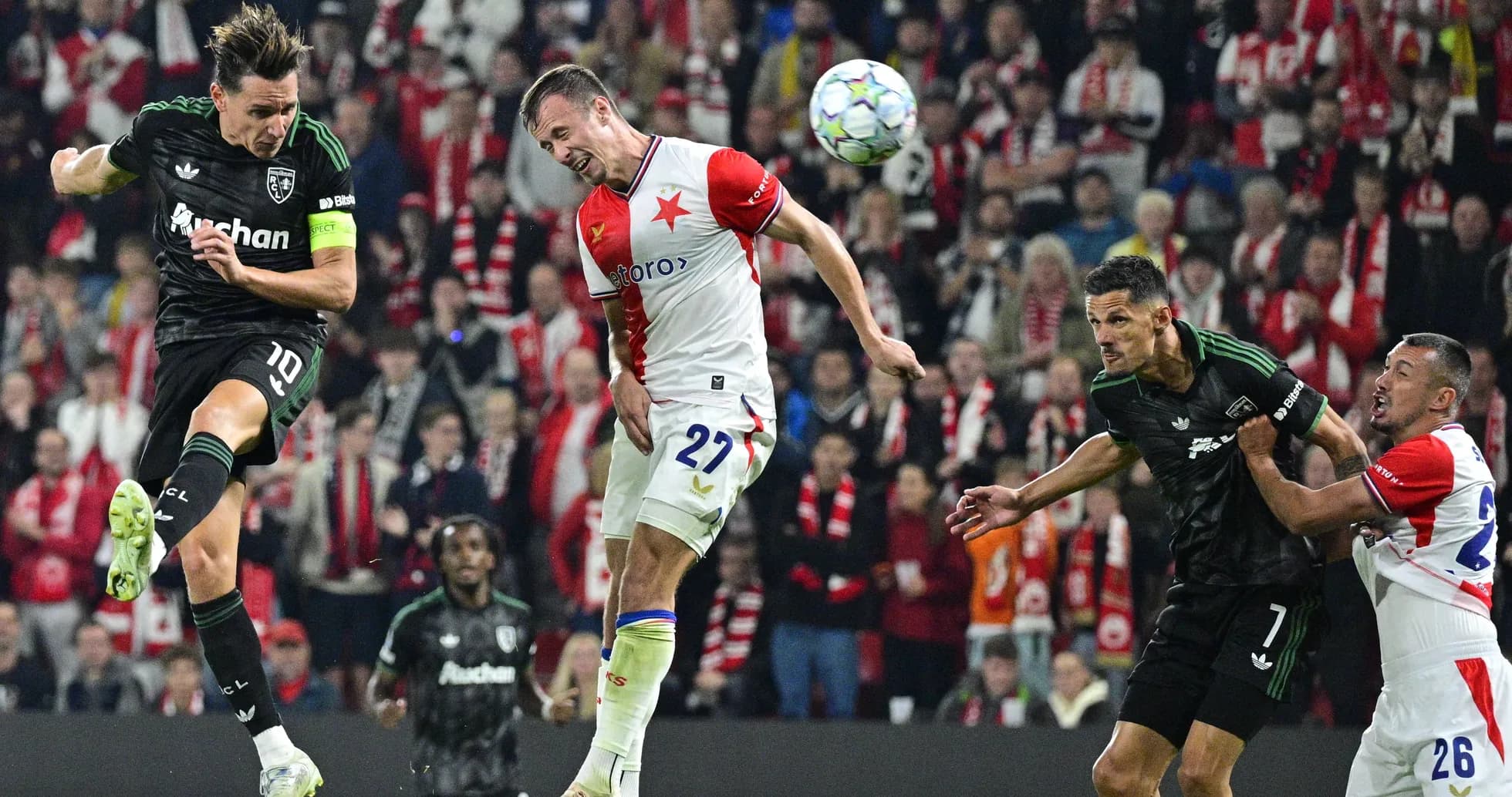 Players contesting for the ball during a match