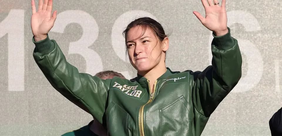 Athlete waving to the crowd during event