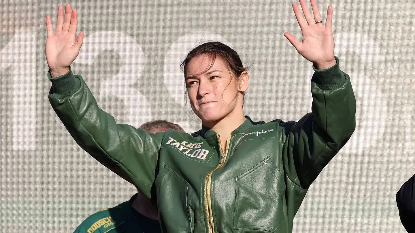 Athlete waving to the crowd during event