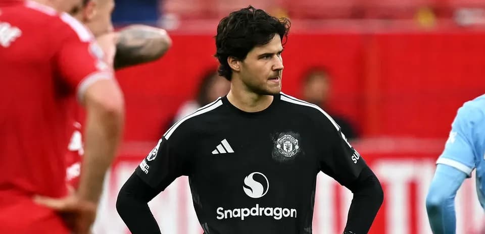 Goalkeeper in black jersey during match