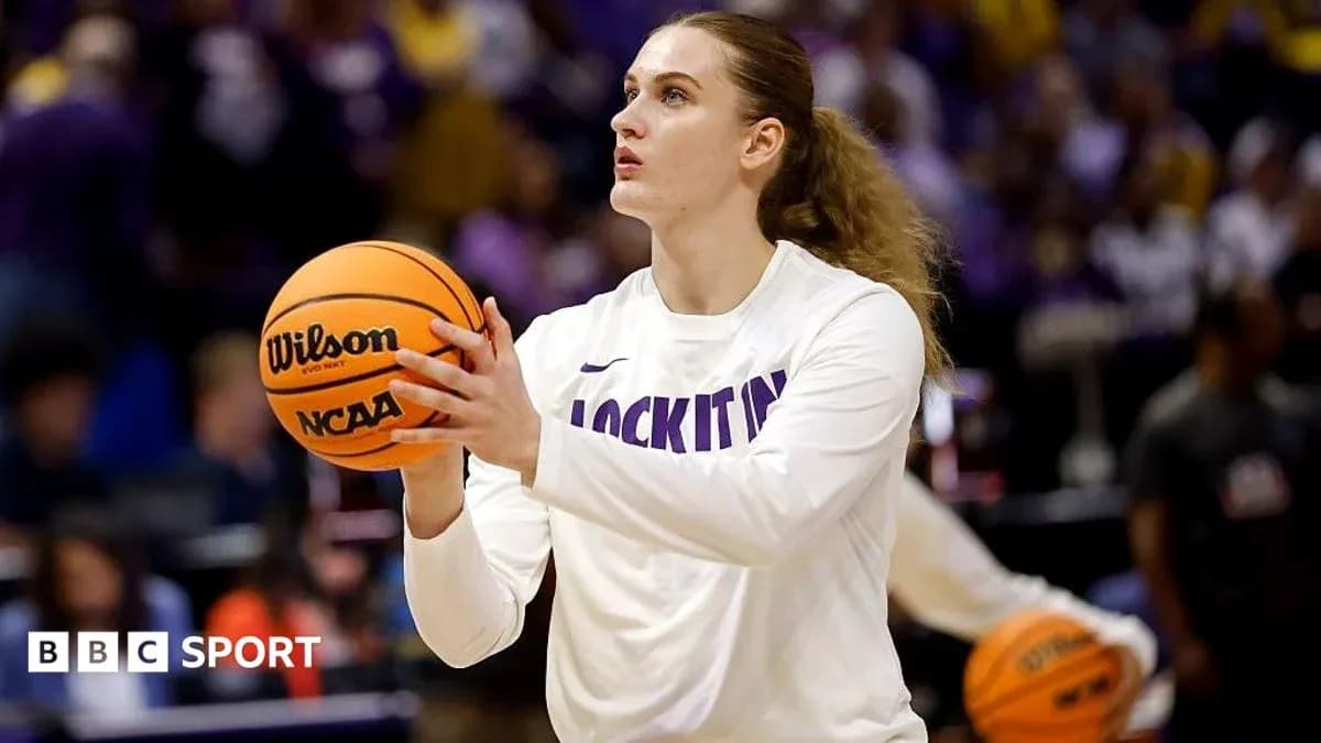 Player practicing shooting with basketball before game