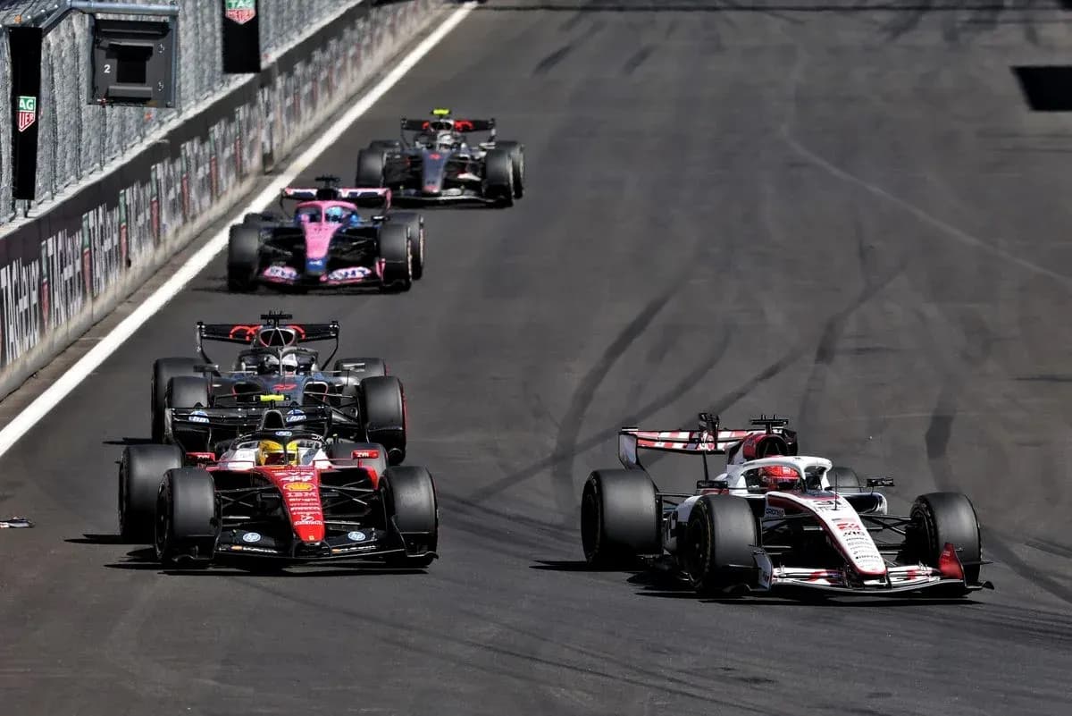Formula 1 cars racing on track during competition