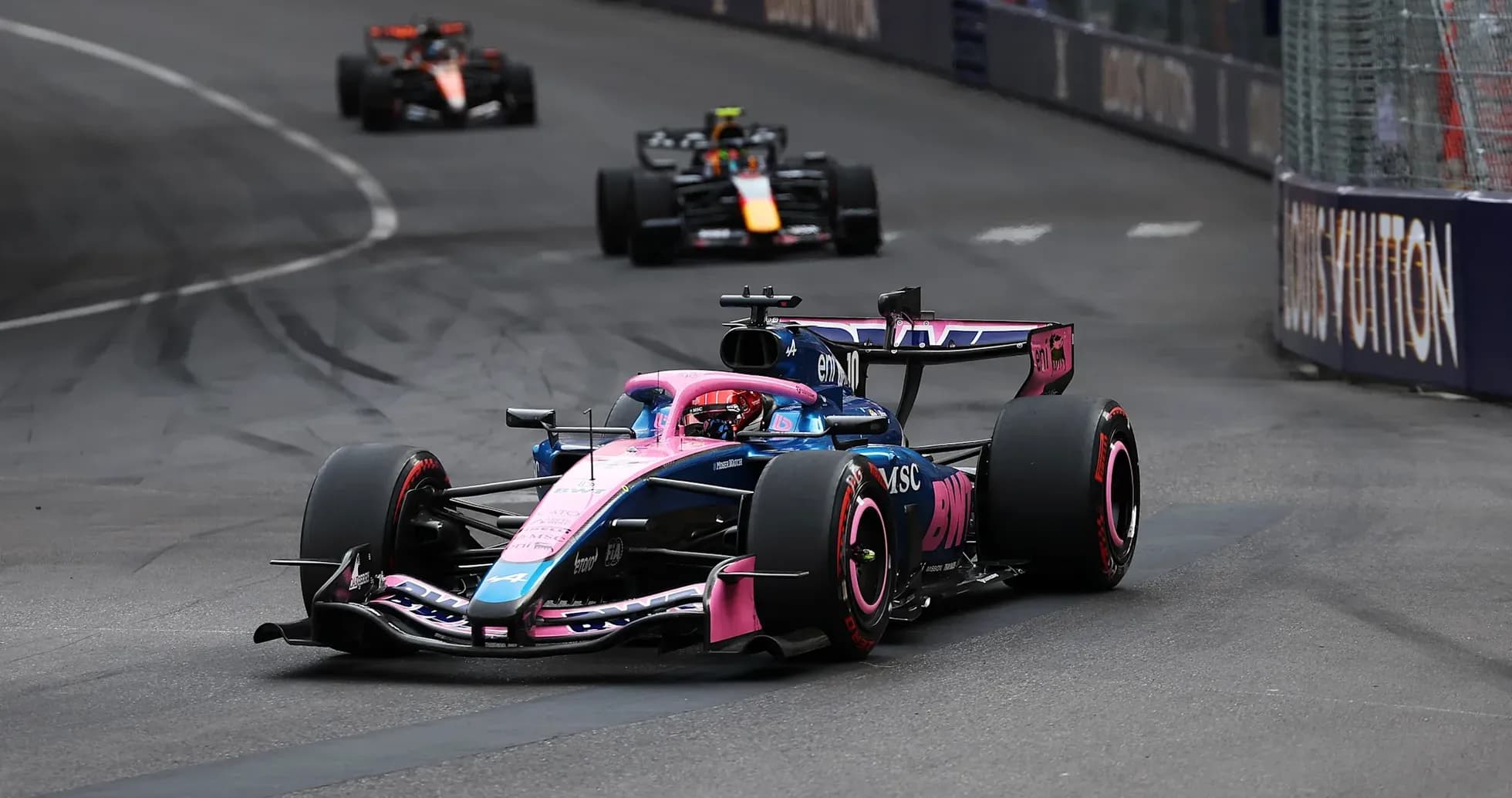 Racing car navigating a turn on the track