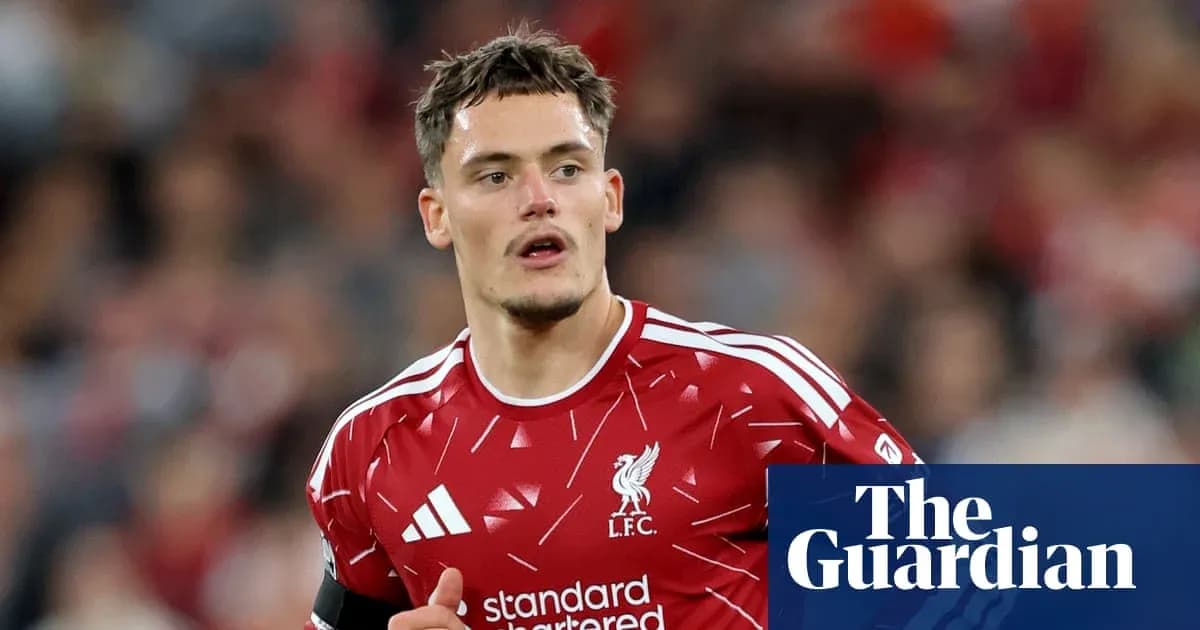 Player in red Liverpool kit during match