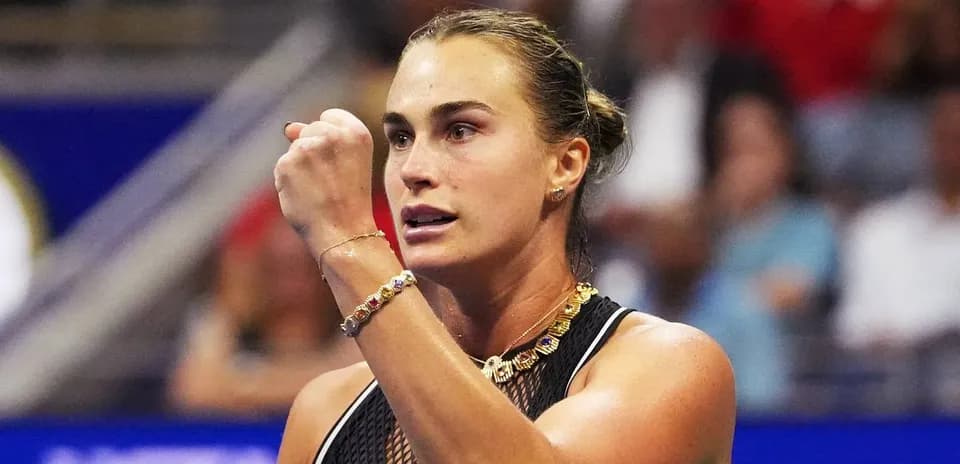 Tennis player celebrating a point during match