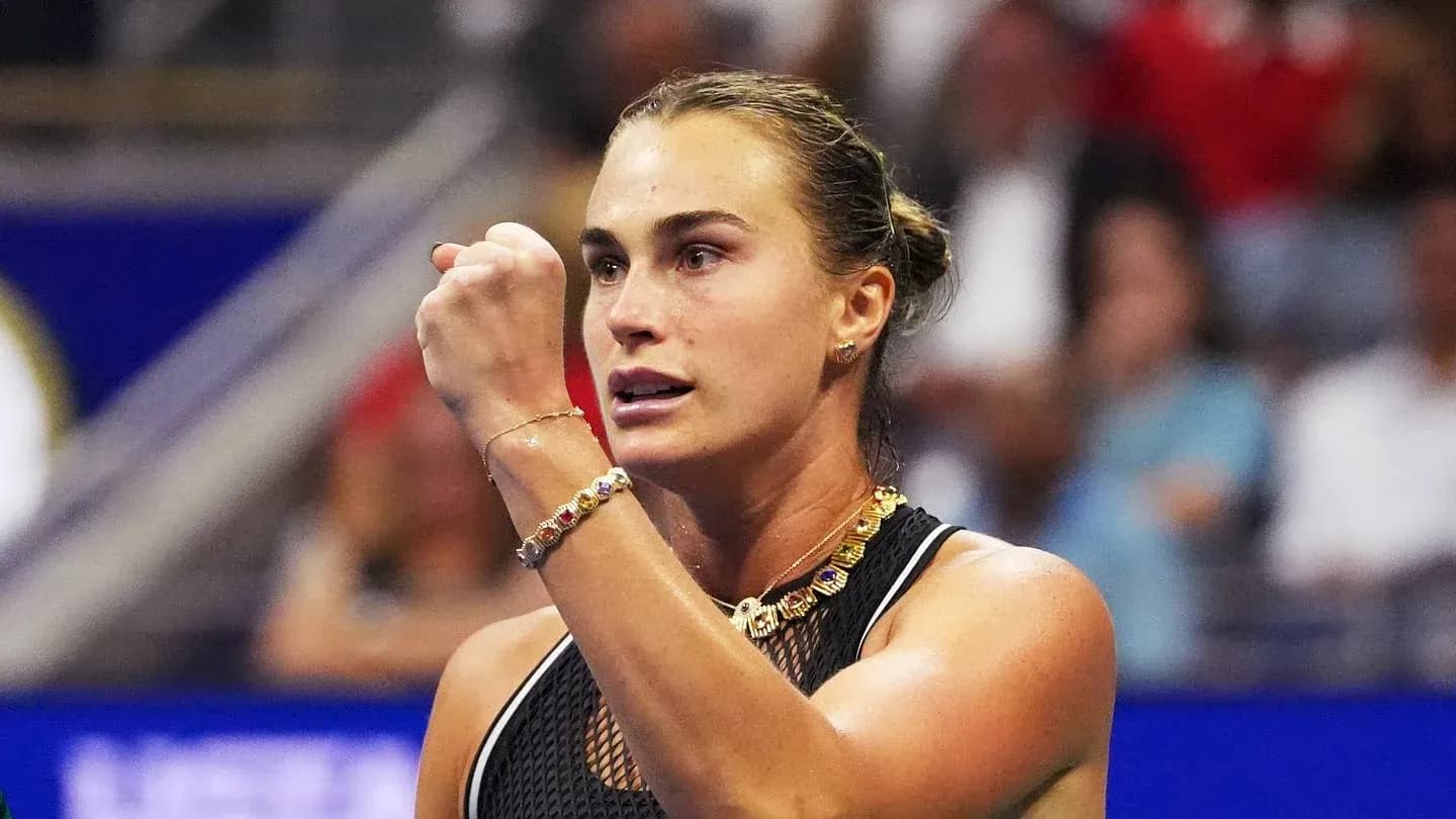 Tennis player celebrating a point during match