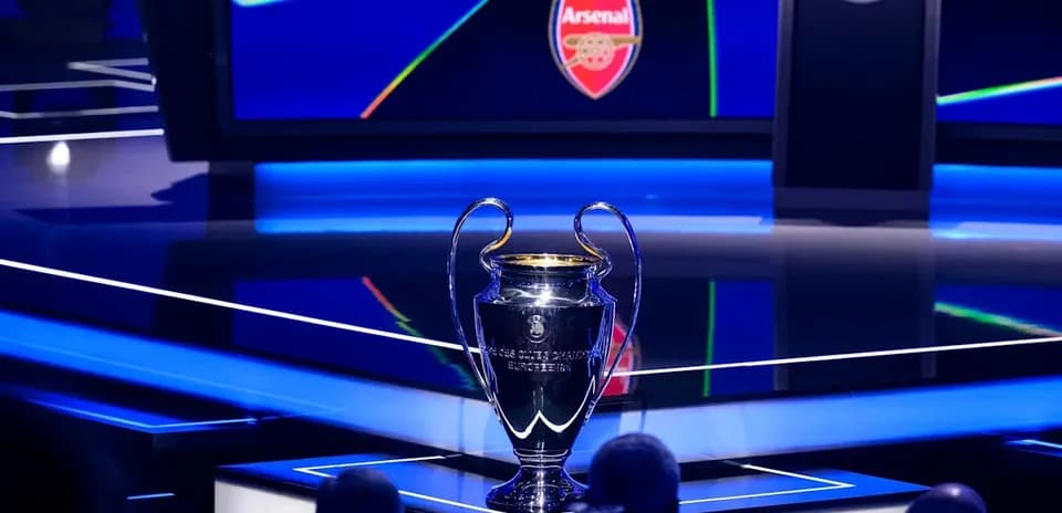 Champions League trophy displayed at event stage