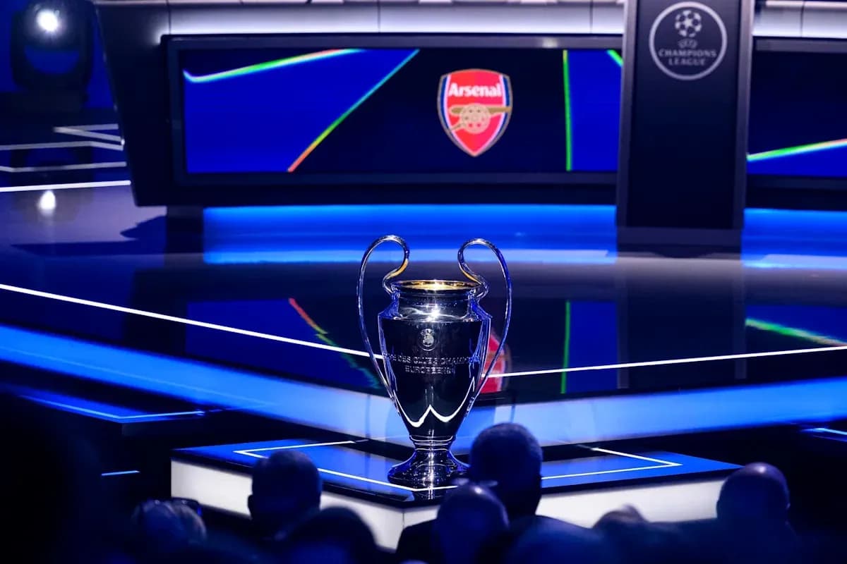 Champions League trophy displayed at event stage
