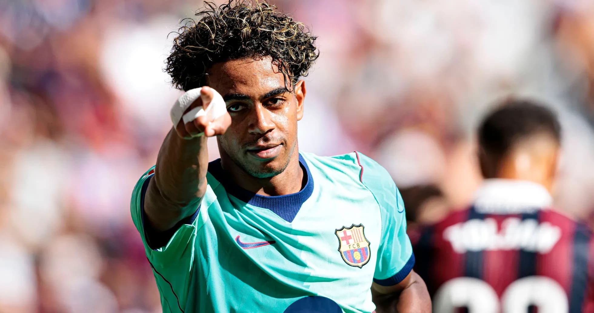 Player celebrating and pointing during a match