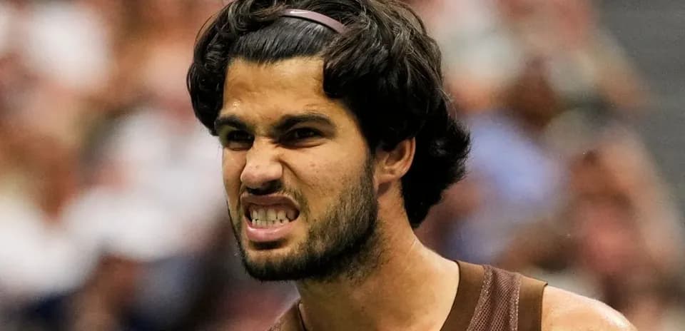Tennis player celebrating with a clenched fist