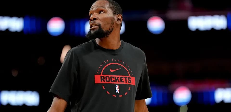Player wearing Rockets shirt during warm-up session