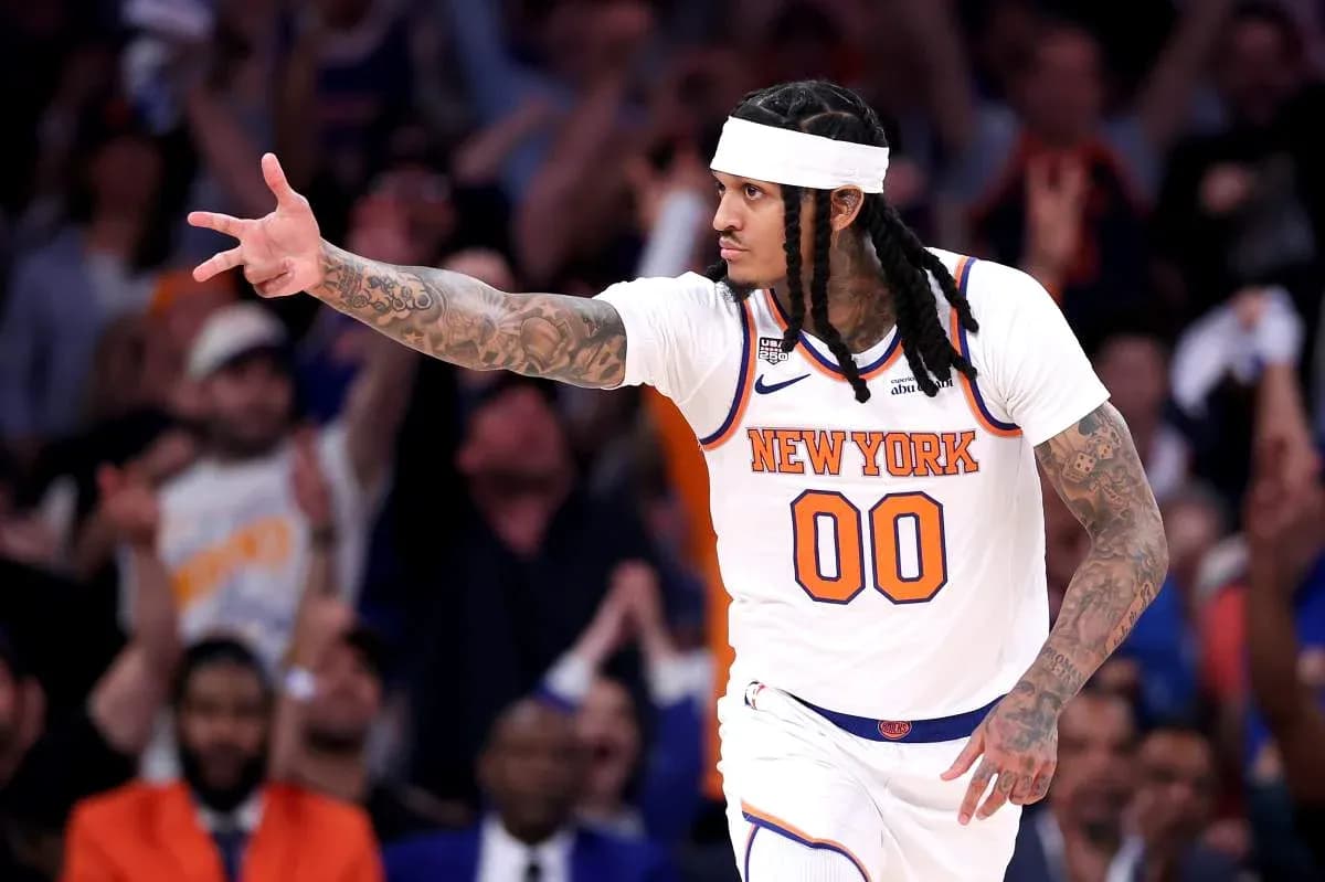 Player celebrating during a New York Knicks game Player celebrating during a New York Knicks game