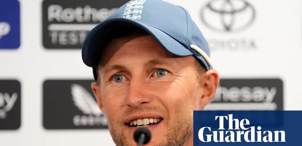 Cricketer speaking at press conference with microphone