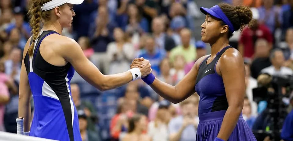 Players shaking hands after a tennis match