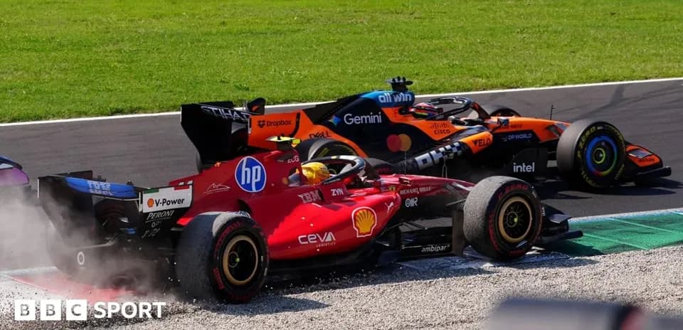 Ferrari and McLaren cars competing on track