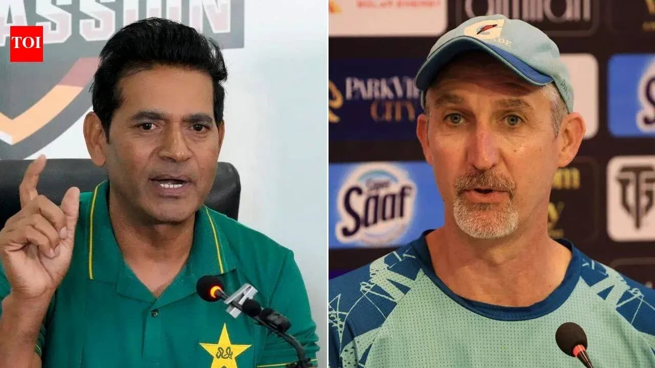 Two coaches speaking at press conference