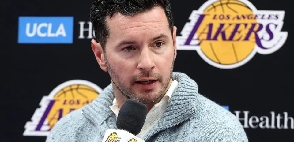 Person speaking at Los Angeles Lakers press conference