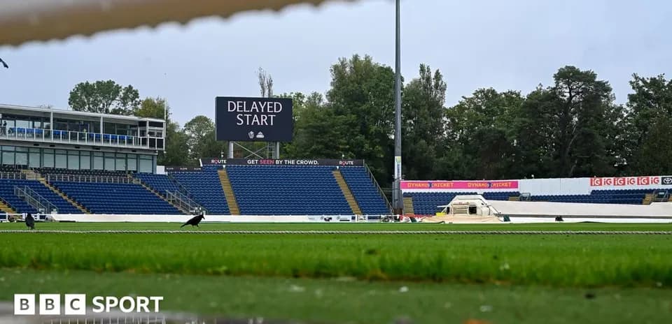 Cricket ground with delayed start announcement on screen