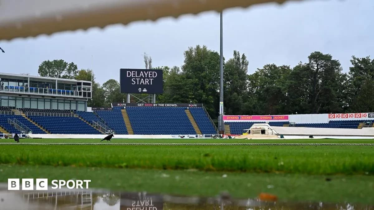 Cricket ground with delayed start announcement on screen