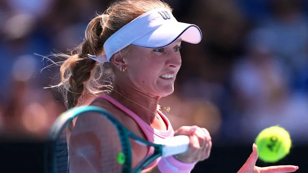 Female tennis player preparing to hit the ball