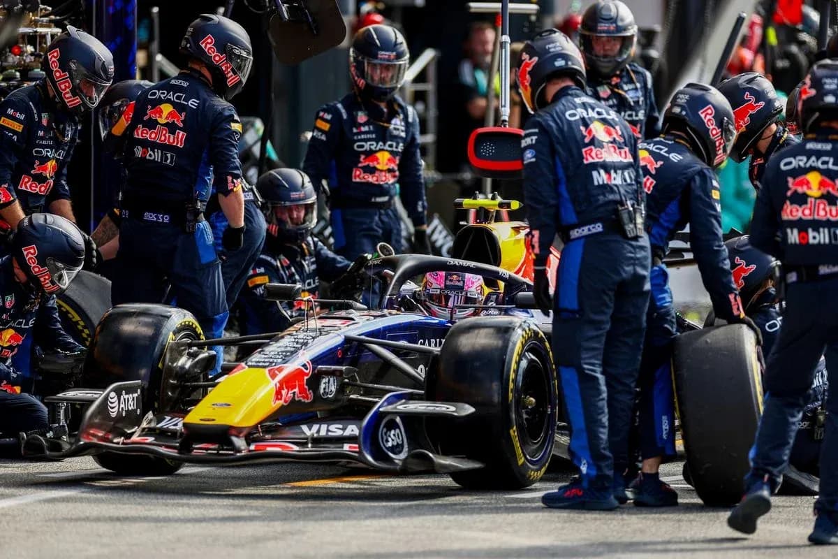 Red Bull Racing team performing a pit stop on car