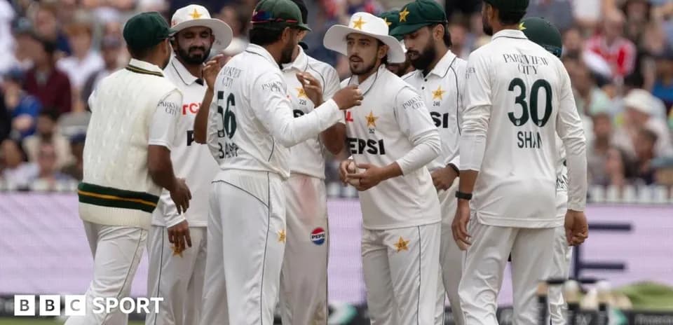 Pakistani cricket team celebrating a wicket on field