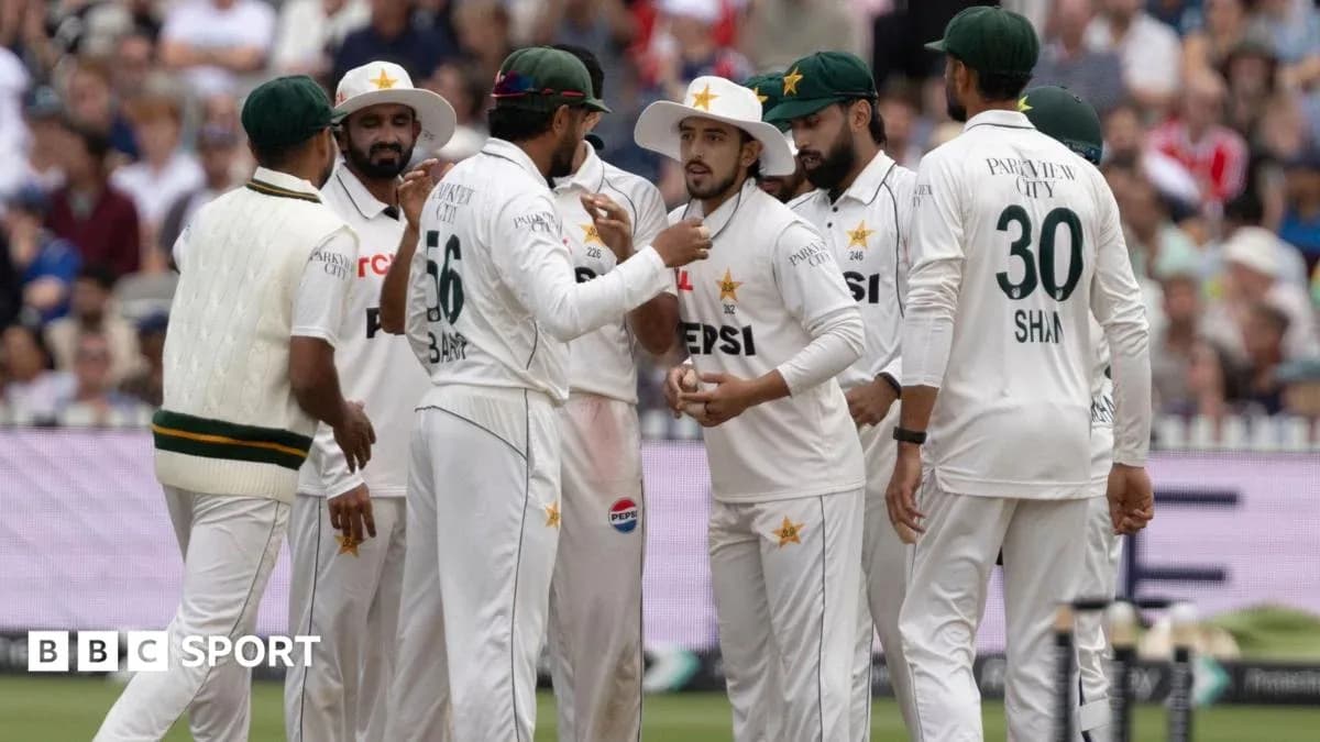 Pakistani cricket team celebrating a wicket on field