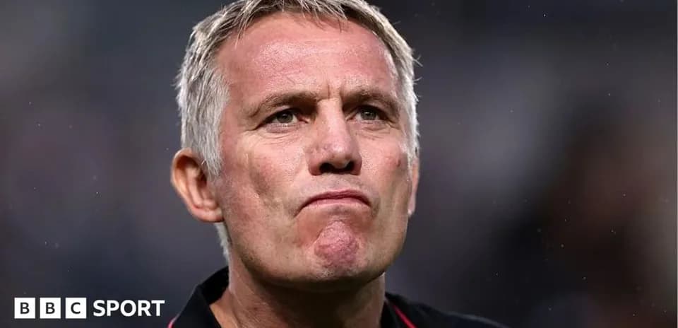 Coach looking focused during a match