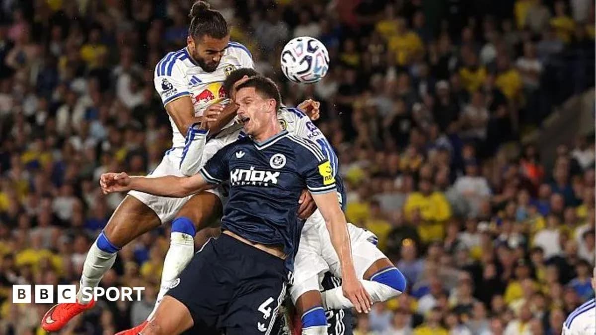 Players contesting for the ball during a match
