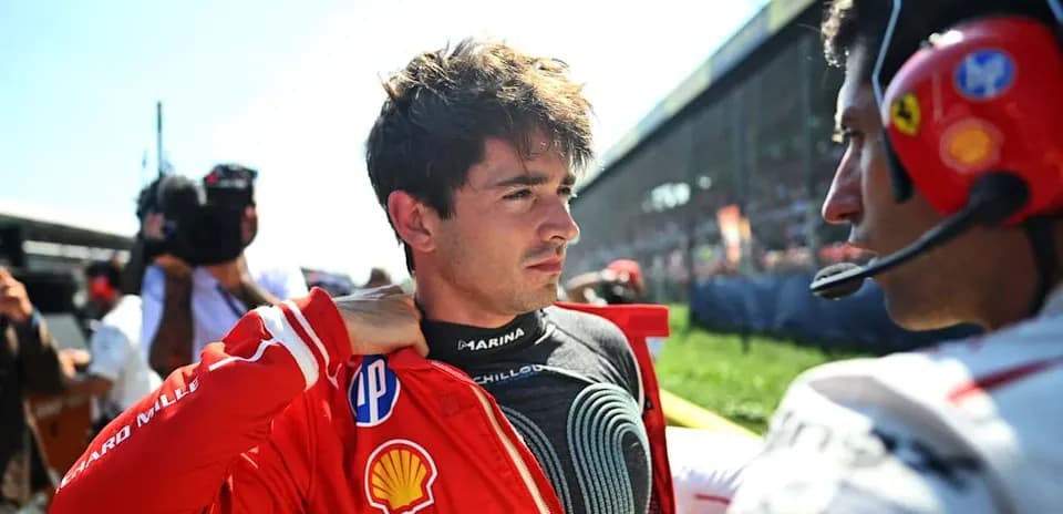 Driver adjusting his racing suit before the race