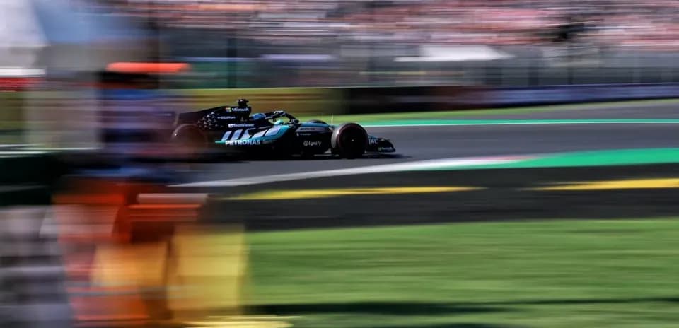 Formula 1 car racing around a track