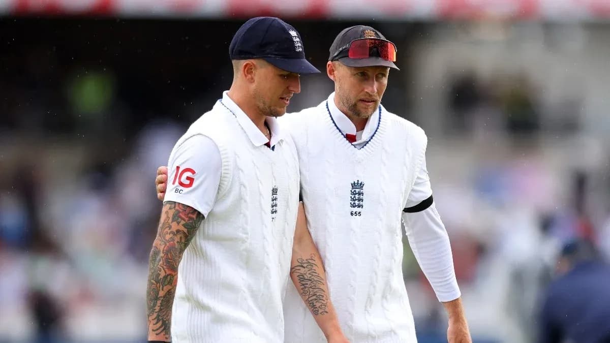 Two England players walking off the field together