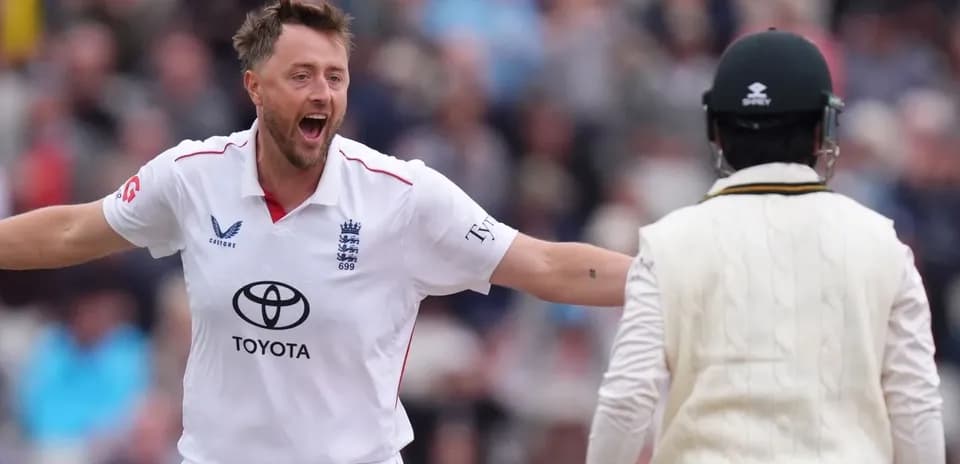 Bowler celebrating after taking a wicket in cricket match