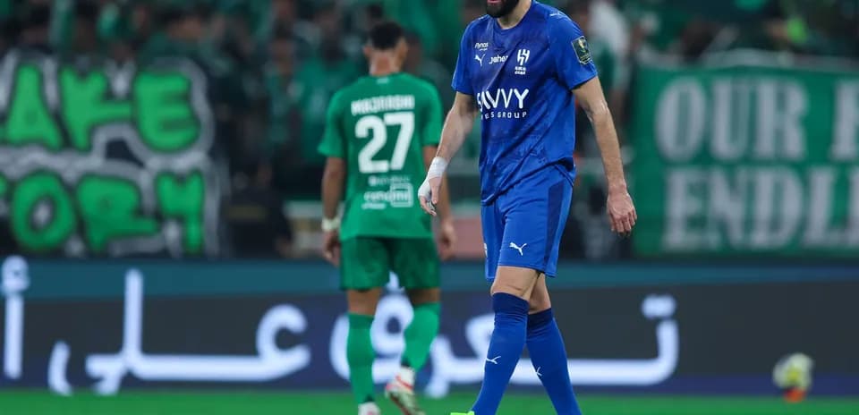 Player walking on field during football match