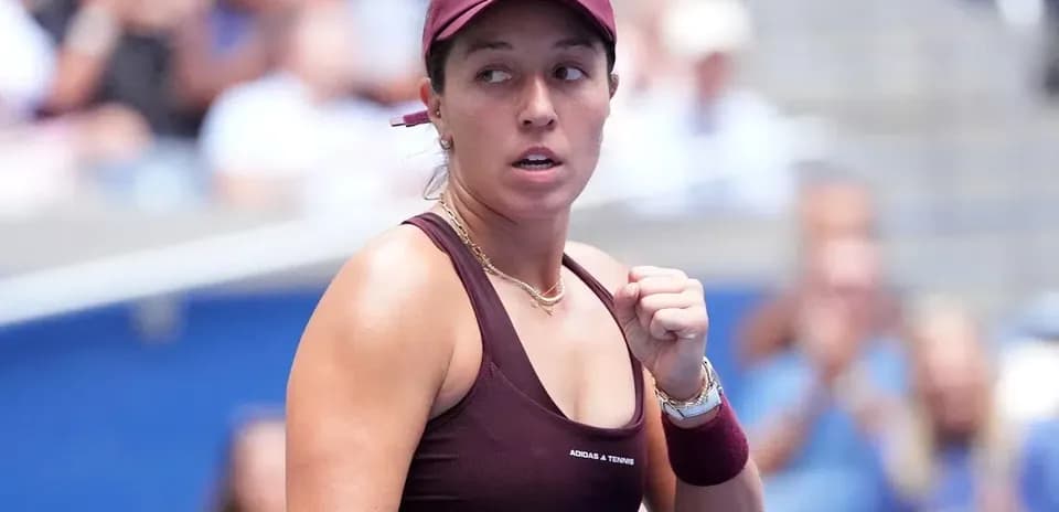 Tennis player celebrating during match at tournament