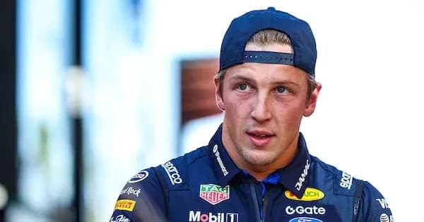 Driver in team uniform during race event