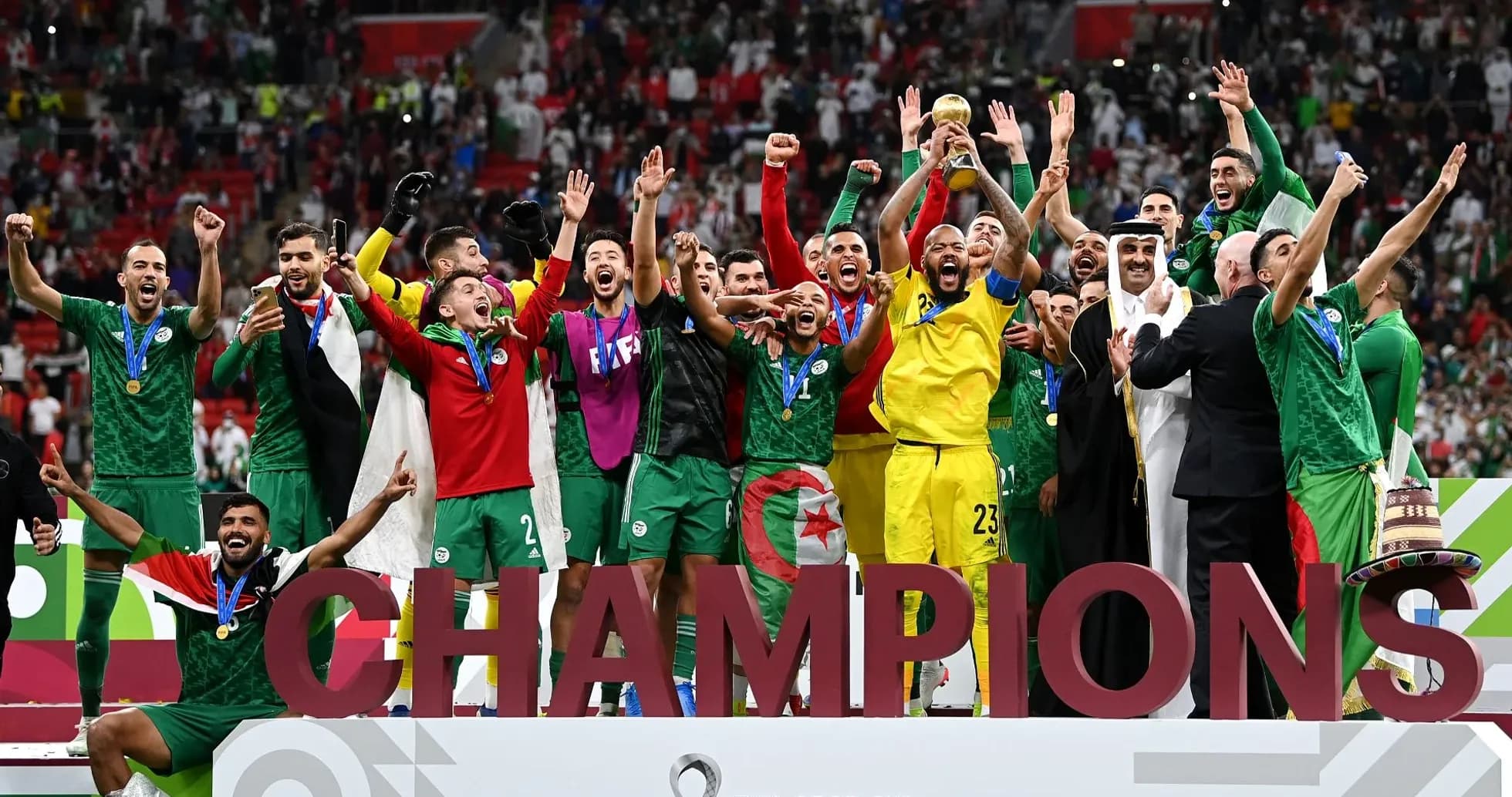 Algerian team celebrating FIFA Arab Cup victory