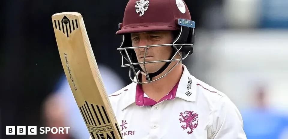 Cricketer from Somerset team holding a bat