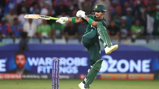 Batsman hitting a shot during cricket match