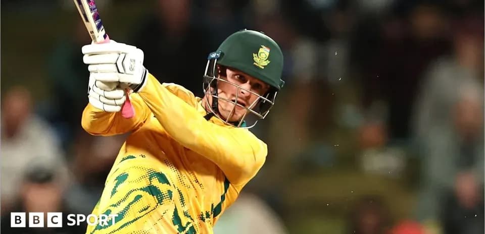 Batter hitting a ball during a cricket match
