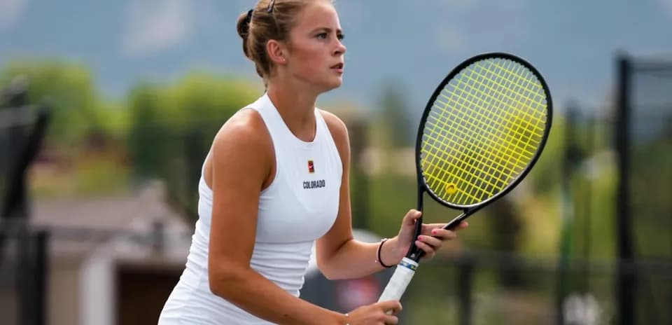 Female tennis player preparing to hit a shot