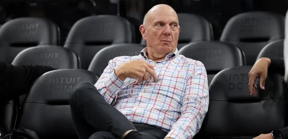 Man sitting in arena seats during event