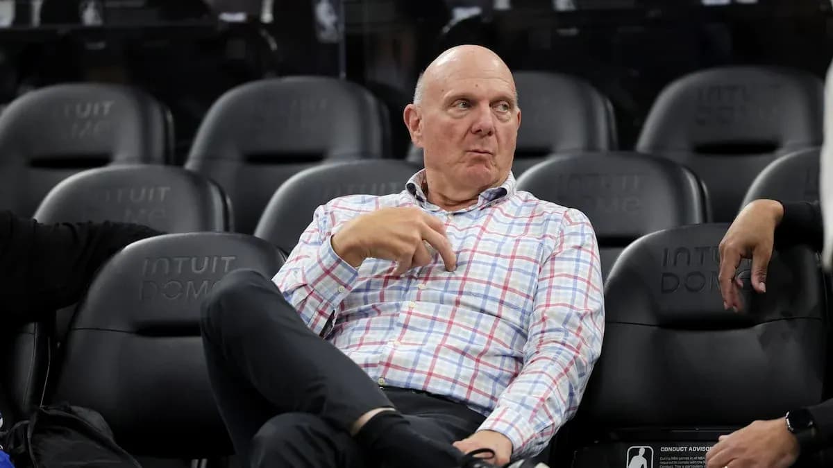 Man sitting in arena seats during event