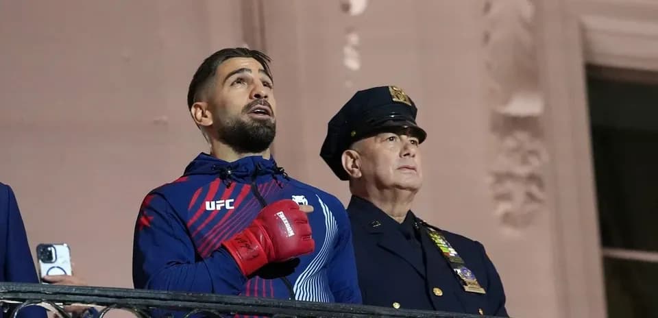 UFC fighter and police officer during national anthem