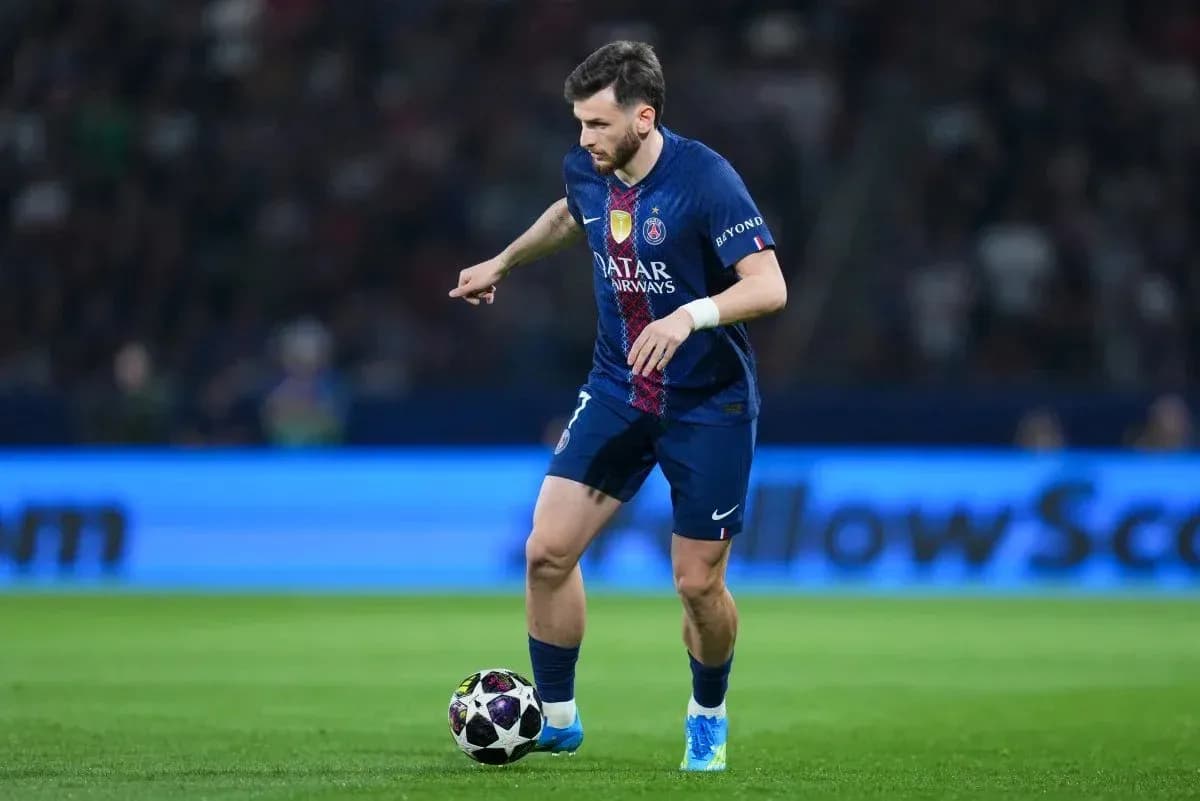 Player dribbling the ball on the pitch