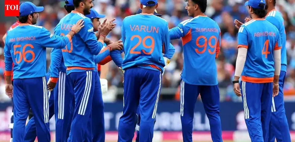 Cricket team celebrating a wicket on the field