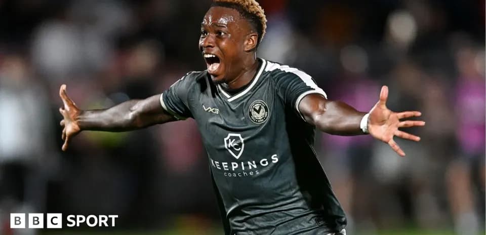Player celebrating a goal in football match