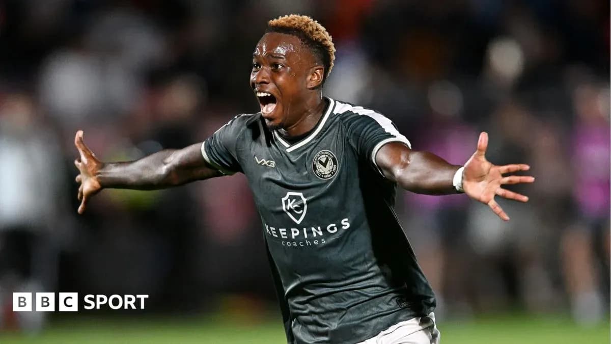Player celebrating a goal in football match
